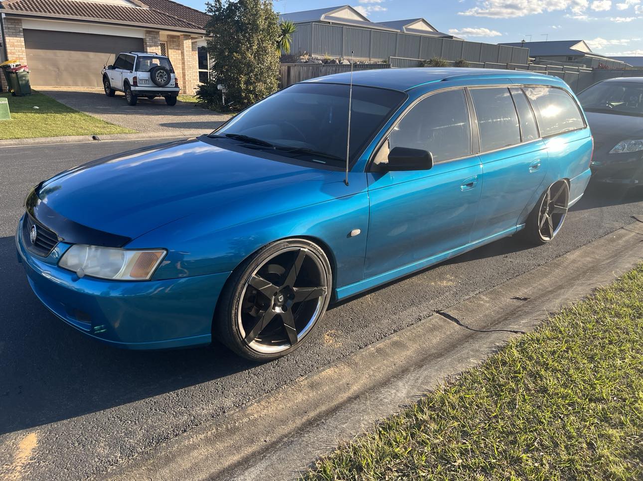 A Holden wagon finished in metallic blue by Easy As Refinishing